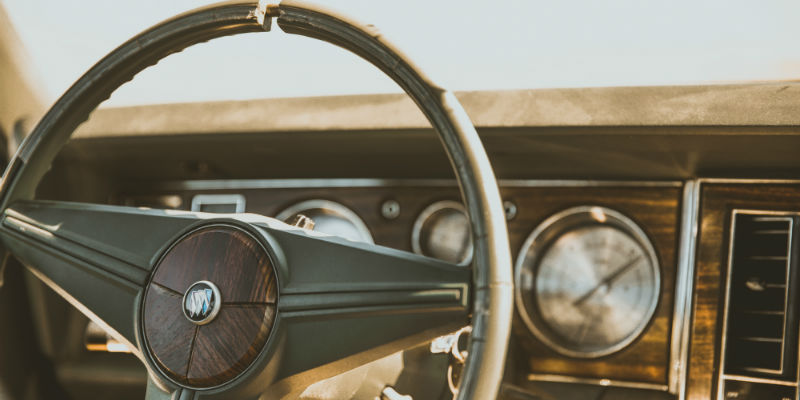 Steering wheel and inside of antique car