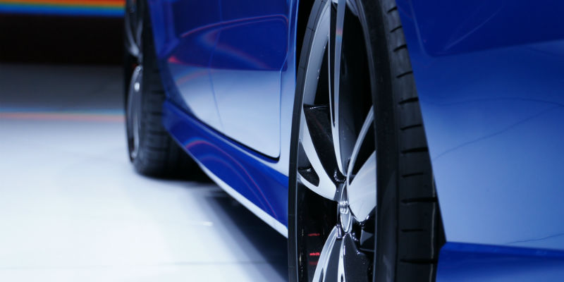 Wheel of blue vehicle
